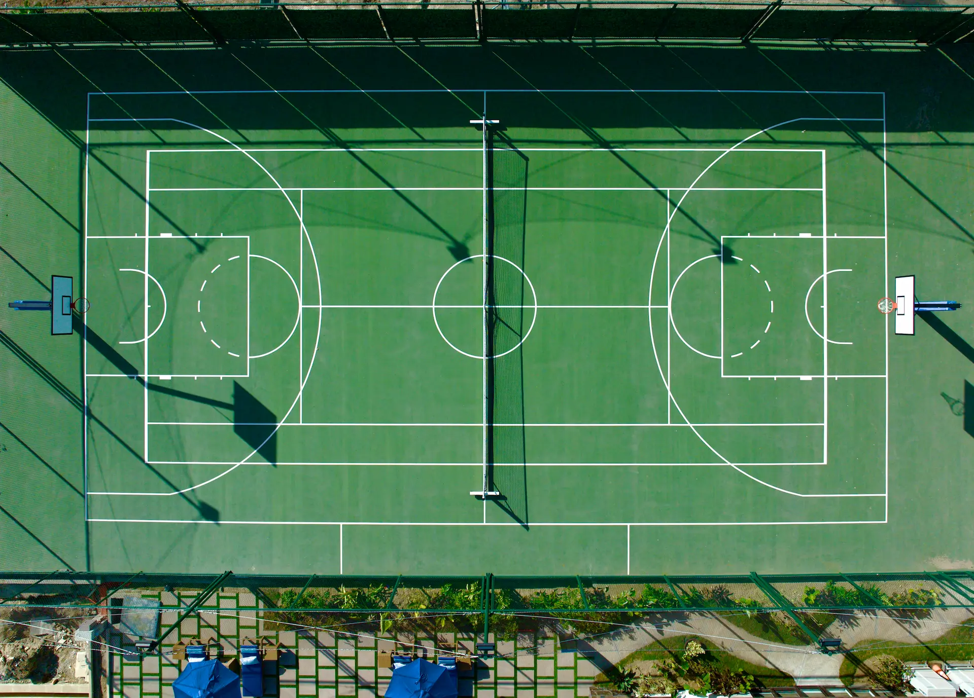 The court offers spaces for tennis, basketball, and pickleball, catering to every passion for play.